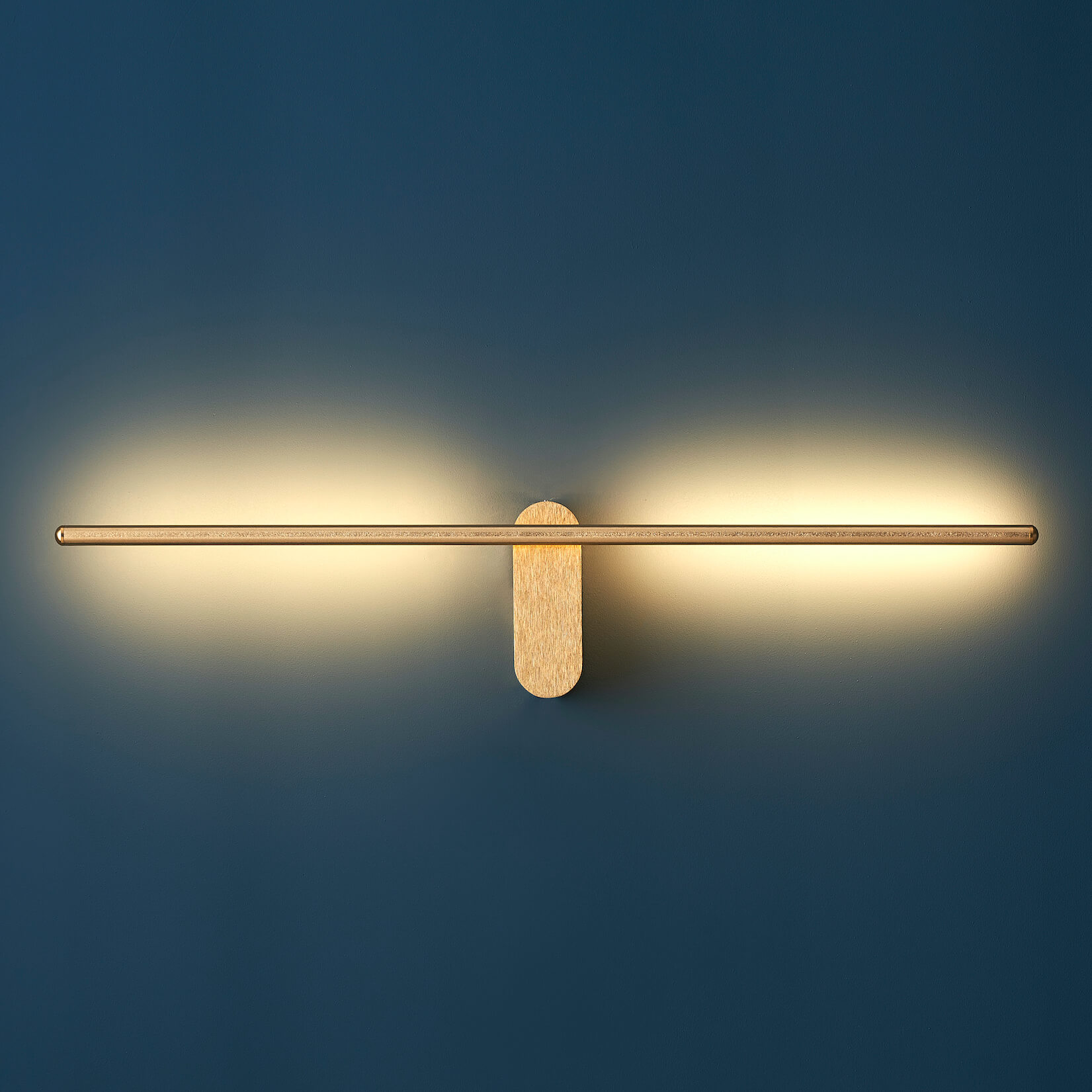 Long golden pivoting wall lamp Melbourne